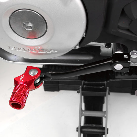 ZETA forged shift lever for Honda, 10mm model ZE90-4512, mounted on a vehicle gear shift, showcasing durable metal construction.
