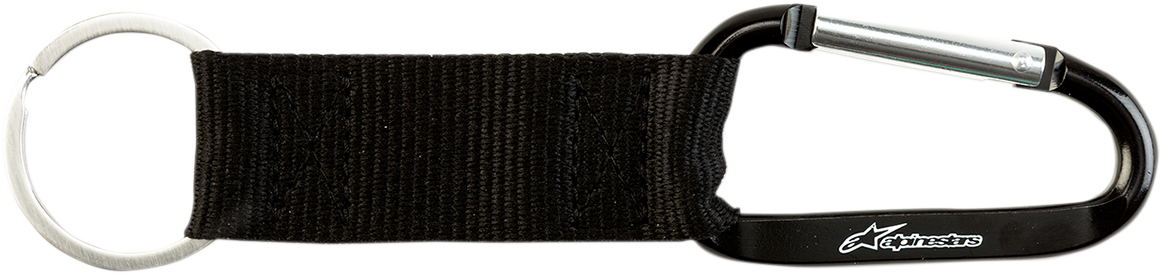 Black Alpinstars key fob with snap hook, compact and durable keychain accessory for motorcycles and gear.