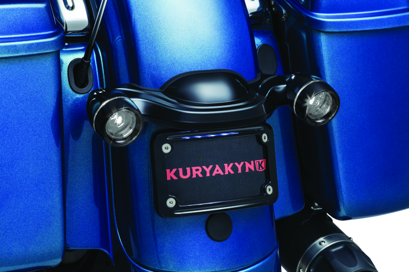 Kuryakyn Deep Dish Bezel for Bullet Turn Signals with smoke lens in gloss black, designed for motorcycle lighting accessories