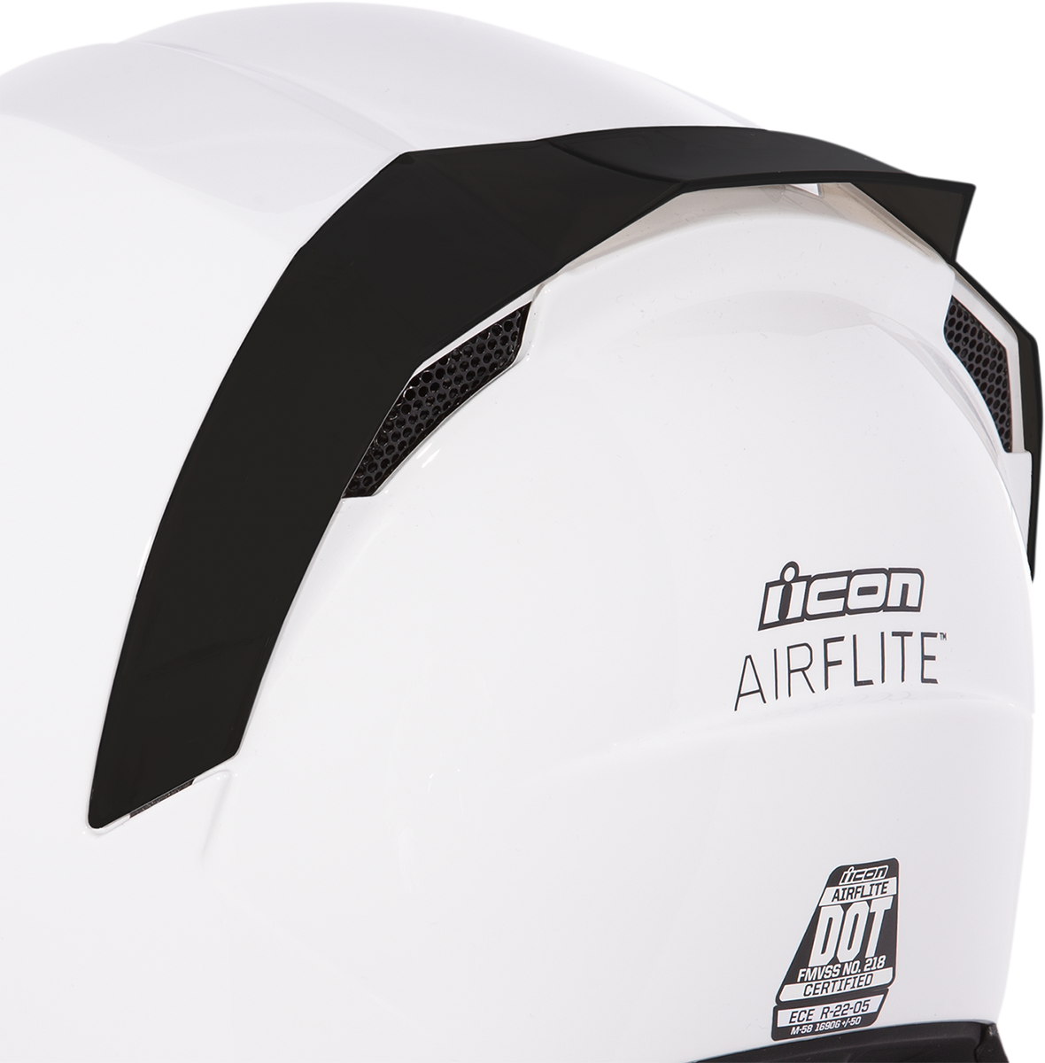 Bill's Exhausts ICON Airflite™ rear spoiler in rubatone black attached to helmet, showing sleek aerodynamic design and mounting details.