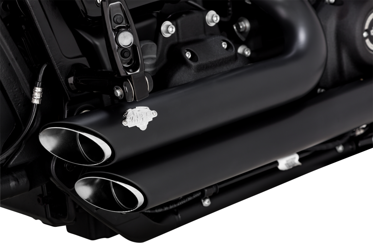 VANCE & HINES Shortshots Staggered PCX™ Exhaust System in matte black for motorcycle, showing the dual exhaust pipes and sleek finish.
