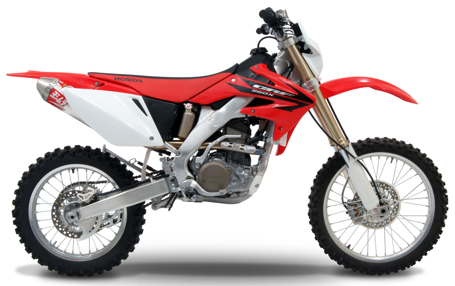 YOSHIMURA RS 2 UTV exhaust header, canister, and end cap system with metallic finish and branding details.