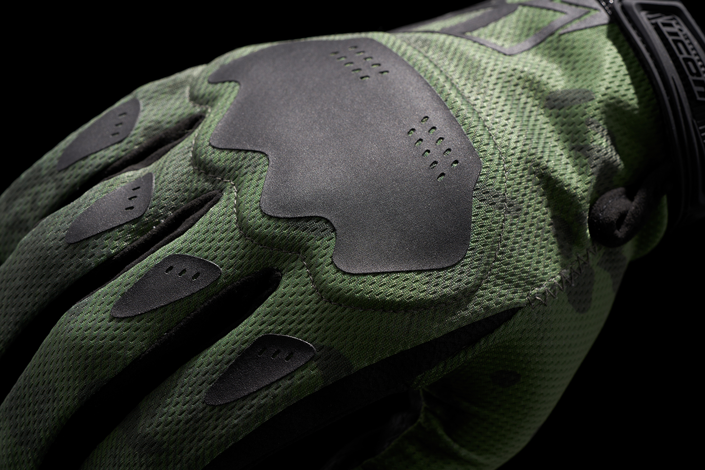 Green camo ICON Hooligan CE gloves in XL size, designed for safety and durability, featuring a rugged glove construction.