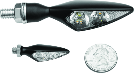 Kuryakyn Rhombus S front left amber turn signal with clear lens for motorcycle, showcasing the sleek, angular design.