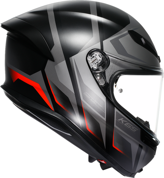 AGV K6 S racing helmet in matte black, gray, and red with aerodynamic design and lightweight construction for motorcycle riding.