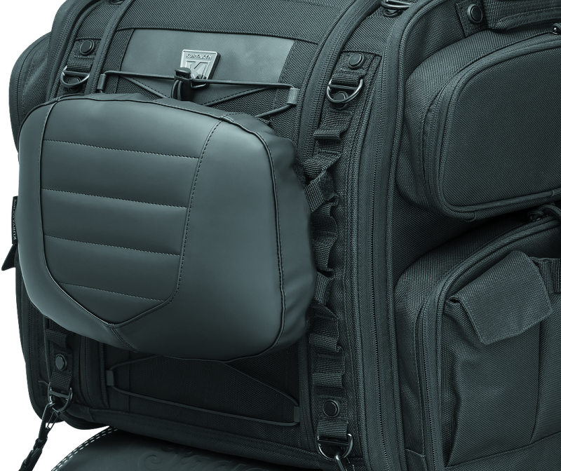 Kuryakyn removable luggage backrest pad attached to XKursion and Momentum motorcycle seats, providing comfort and support.