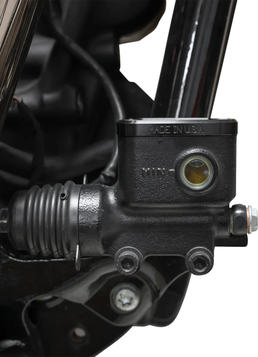 Black rear brake reservoir cap for '18+ Softail by THRASHIN SUPPLY CO., designed for easy installation and durability.