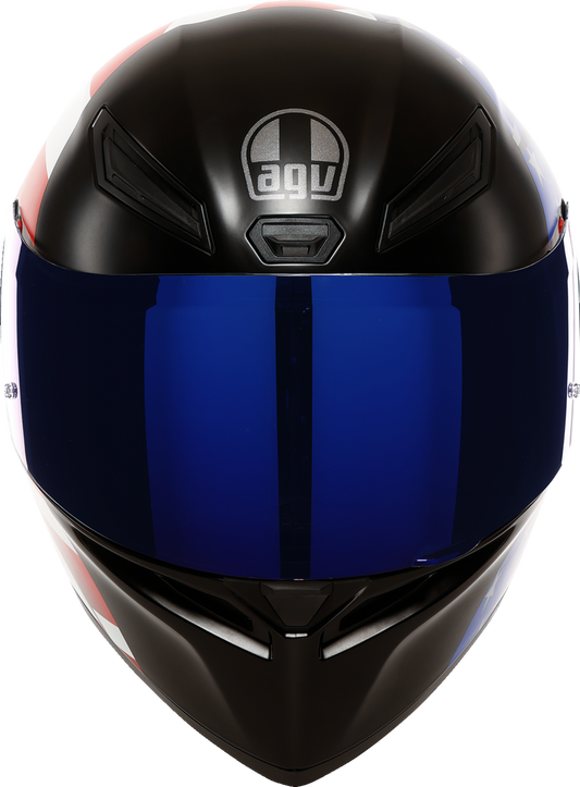 AGV K1 S helmet with US flag design in red, white, and blue, showing the helmet's front view with US flag graphics.