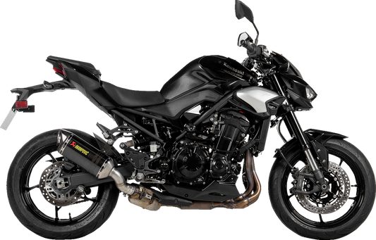 Akradovic slip-on line muffler for Kawasaki Z900 in carbon fiber, designed by AKRAPOVIC, shown on a motorcycle.