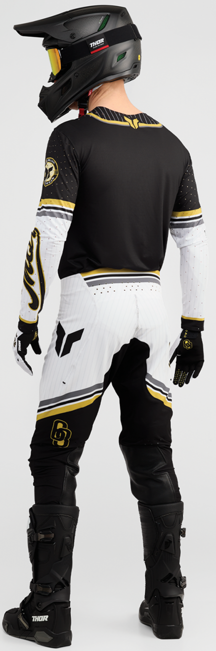 Black and gold THOR Sportmode Baller Pants in US size 32, featuring sporty design and branded details.