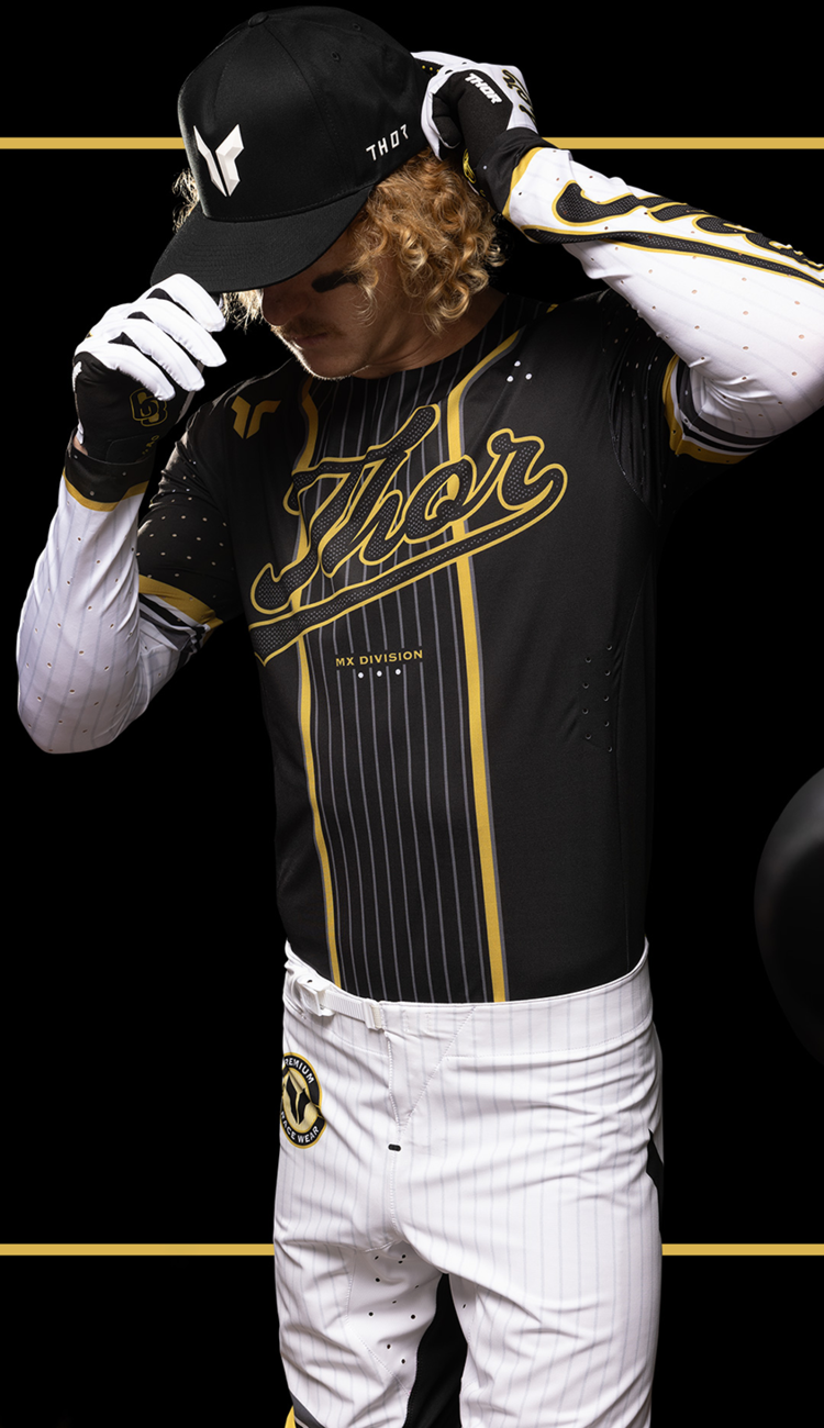 Black and gold THOR Sportmode Baller Pants in US size 32, featuring sporty design and athletic fit.