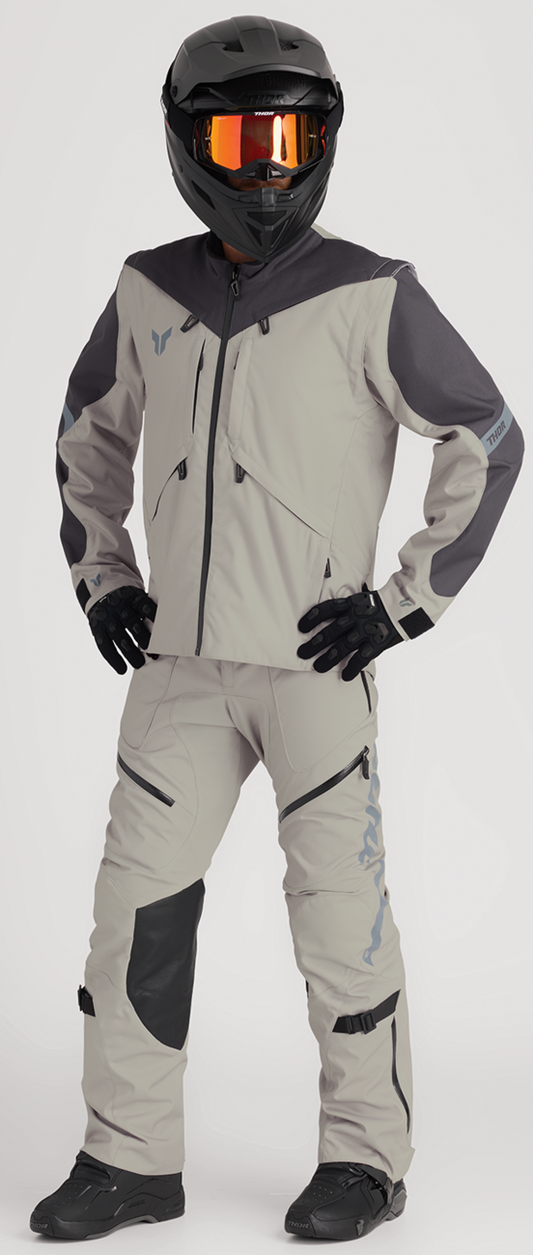 THOR Terrain over-the-boot pants in sand color, US size 40, showcasing durable motorcycle riding gear with reinforced knee areas.