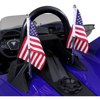 Chrome folding flag pole by Bill's Exhausts with sling shot mechanism, shown extended with flag attached for display.