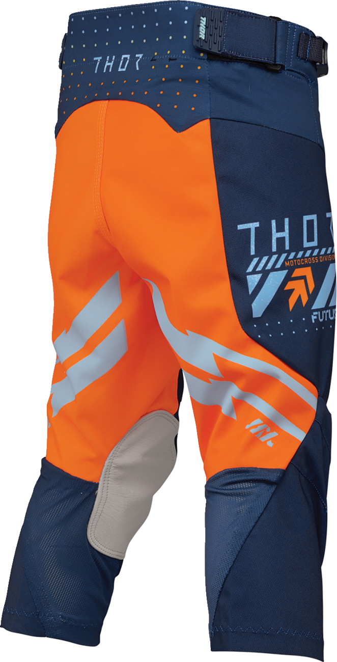 Youth THOR Launchmode Futura Pants in navy and orange with sporty design and adjustable waistband, ideal for active riding.