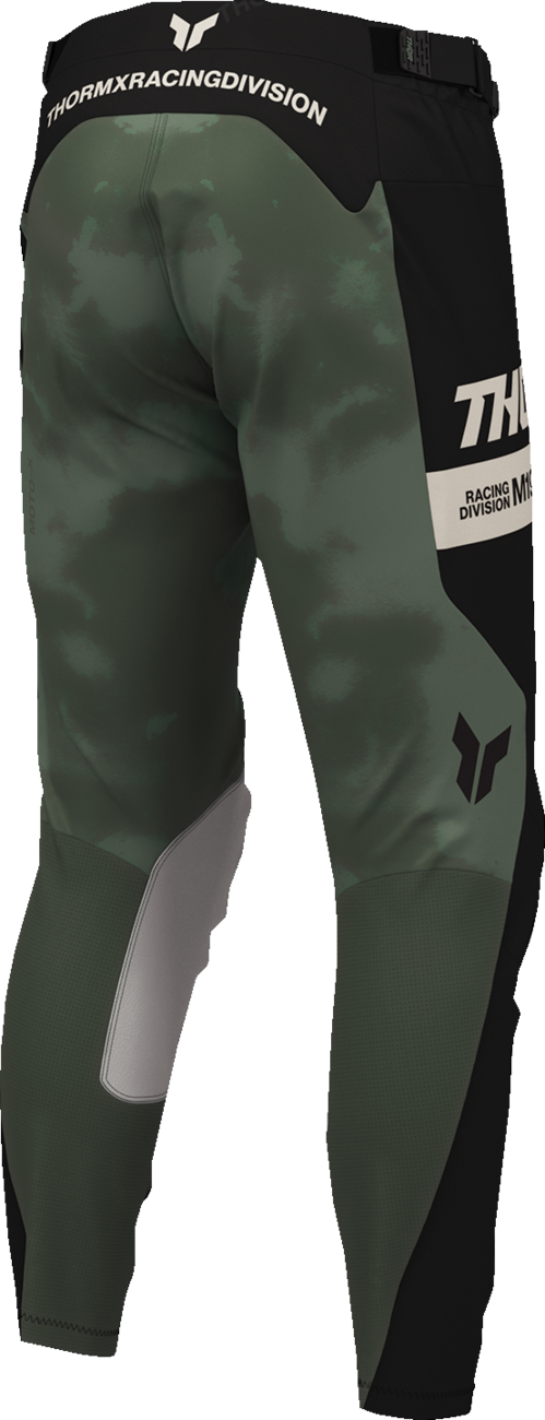 THOR Launchmode bleach pants in black and camo, US size 30, featuring distressed design and tactical style.