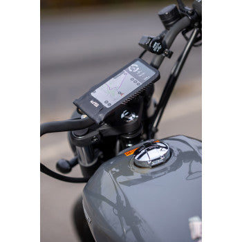 Bill's Exhausts SP CONNECT phone mount mounted on a vehicle, showcasing secure attachment and compatibility with smartphones.