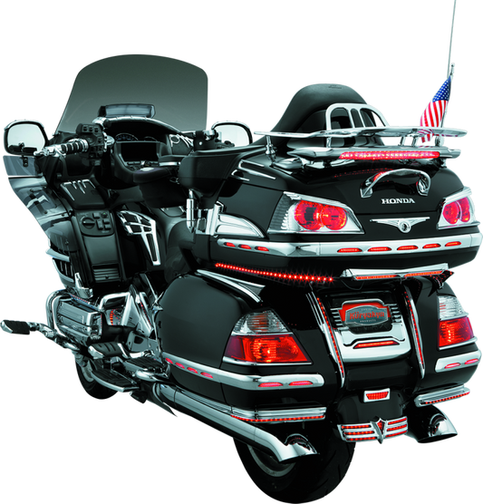 Chrome Kuryakyn trunk keyhole trim for Honda Gold Wing 2001-2017, showcasing a sleek, polished accessory on the motorcycle trunk.