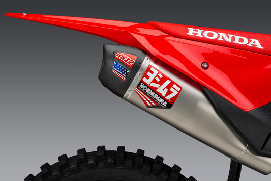 YOSHIMURA RS12-NB010 muffler decal set for performance exhausts, featuring black and silver Yoshimura branding on a decal sheet.