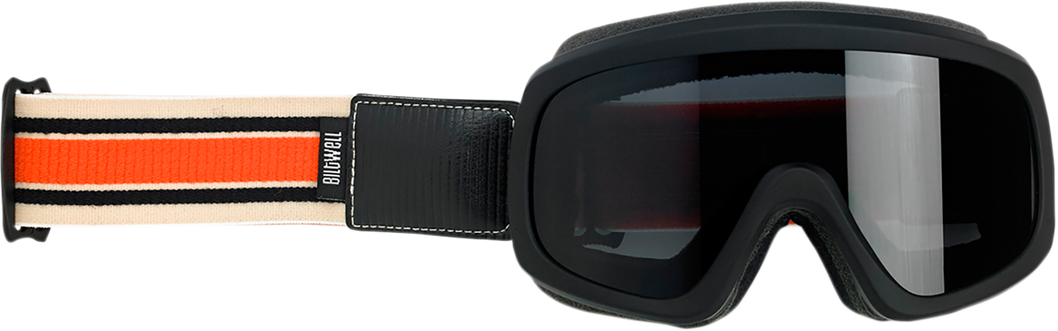 Bill's Exhausts BILT WELL Overland 2.0 Racer goggles in black, orange, and cream with clear lenses and adjustable strap.