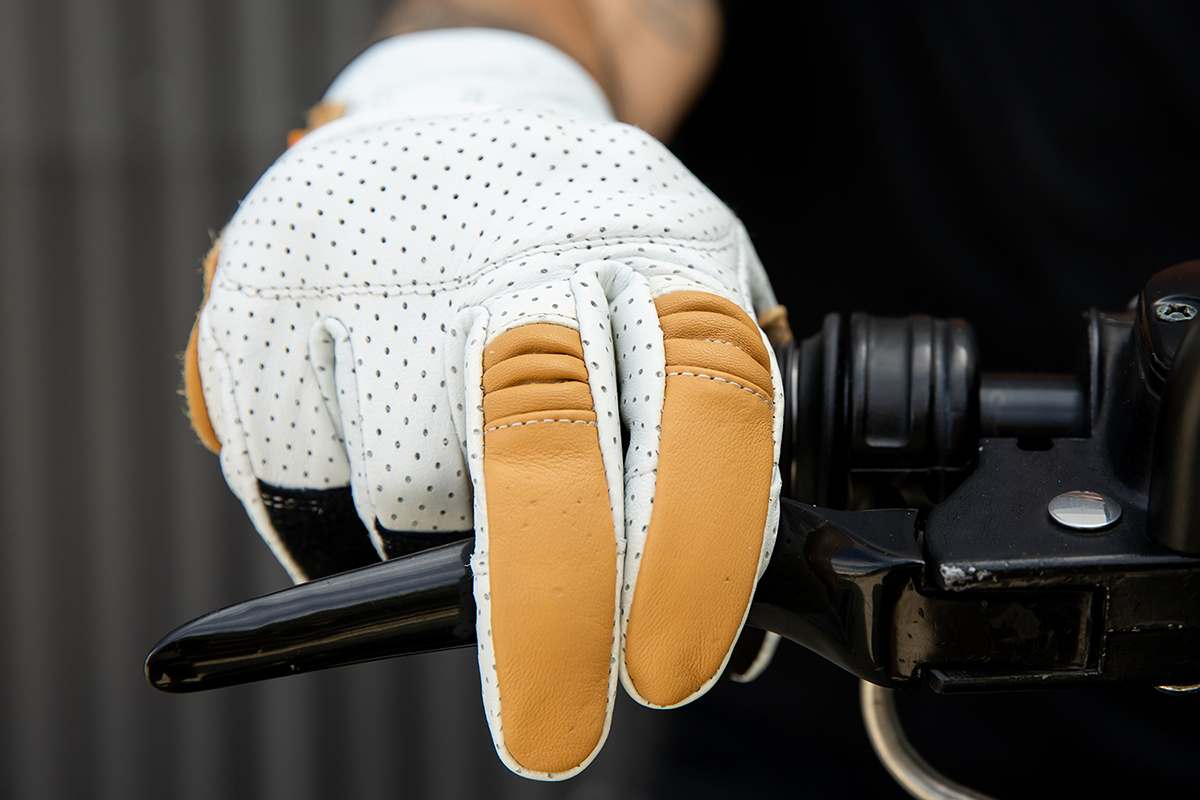 BILTWELL Borrego Gloves in Cement, medium size, black motorcycle gloves with protective knuckles and textured palm for grip.