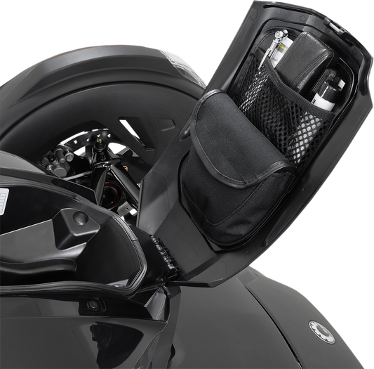 Bill's Exhausts Can-Am glove box organizer for engine storage, black plastic with compartments, fits Can-Am vehicles.