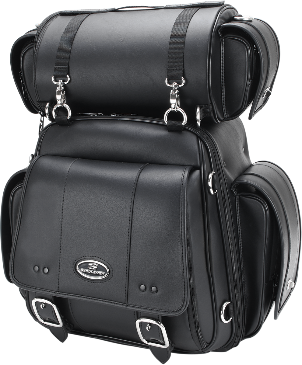 SADDLEMEN Sissy Bar Bag on motorcycle seat, durable black leather with chrome accents, designed for easy storage and style.