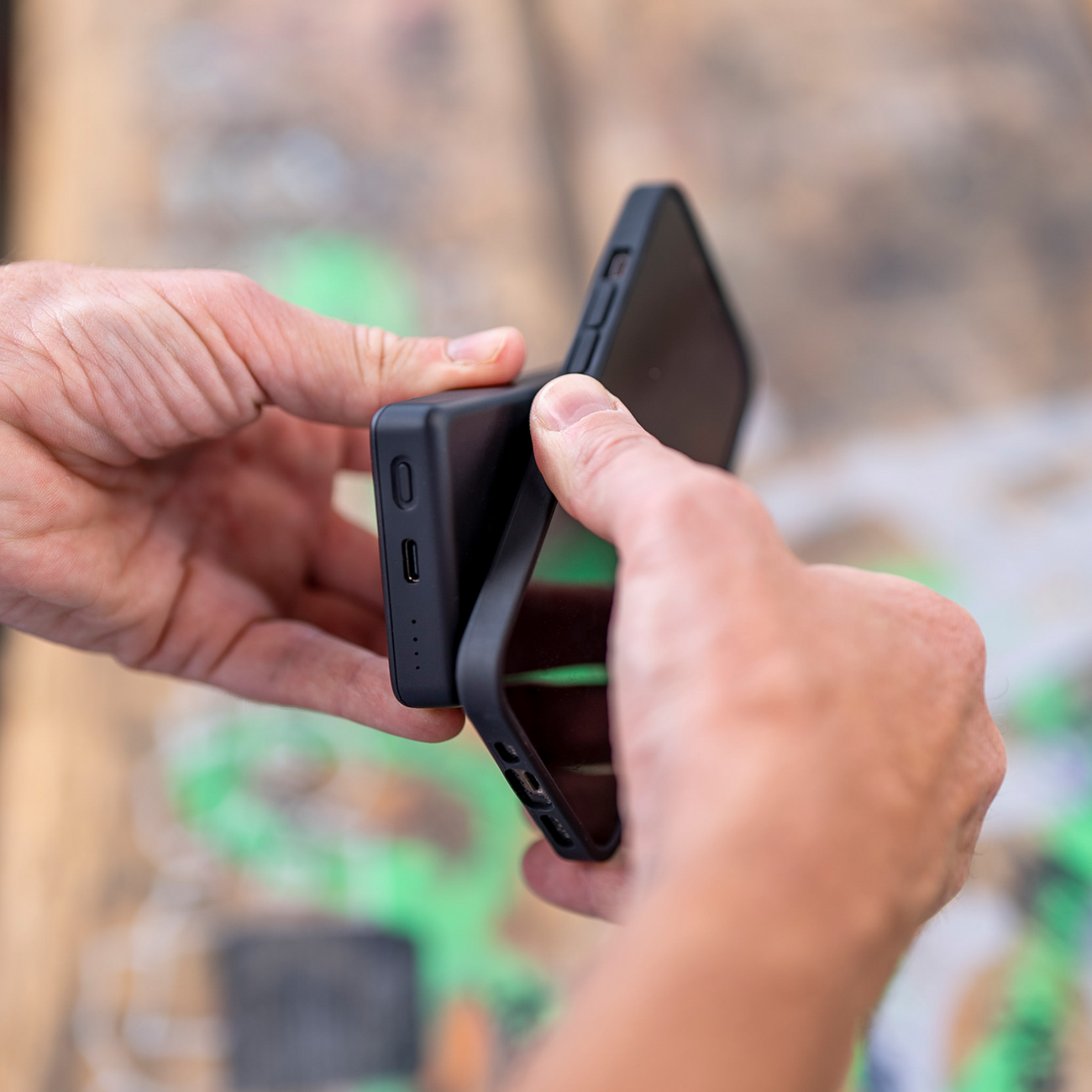 Wireless power bank for phone by Bill's Exhausts, SP CONNECT SPC+ model, showing a compact device with USB ports and charging indicator.