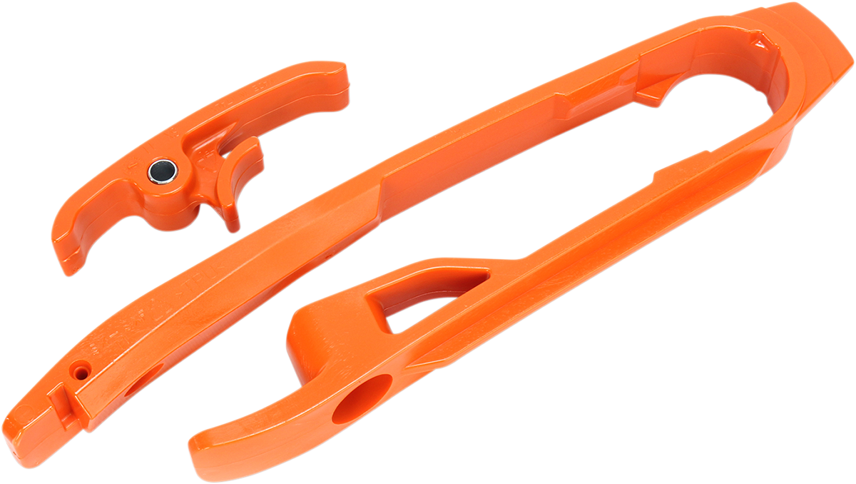 Orange Acerbis chain slider for KTM motorcycles, designed to protect the chain and sprocket from wear and damage.