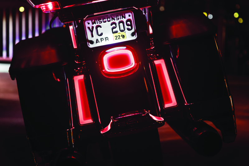 Kuryakyn Tracer LED Inserts for Harley Davidson saddlebag supports, chrome with red auxiliary lighting for touring models