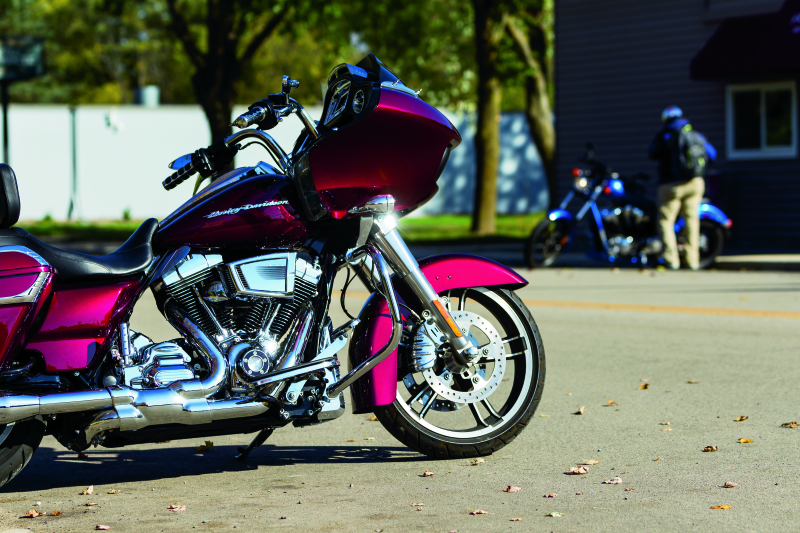 Kuryakyn Saddle Shields heat deflectors mounted on Harley Davidson Touring motorcycle 2009-2010, protecting rider from heat.