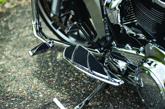 Chrome Kuryakyn Phantom Pegs for cruiser motorcycles, shown without adapters, with sleek chrome finish and mounting hardware visible.