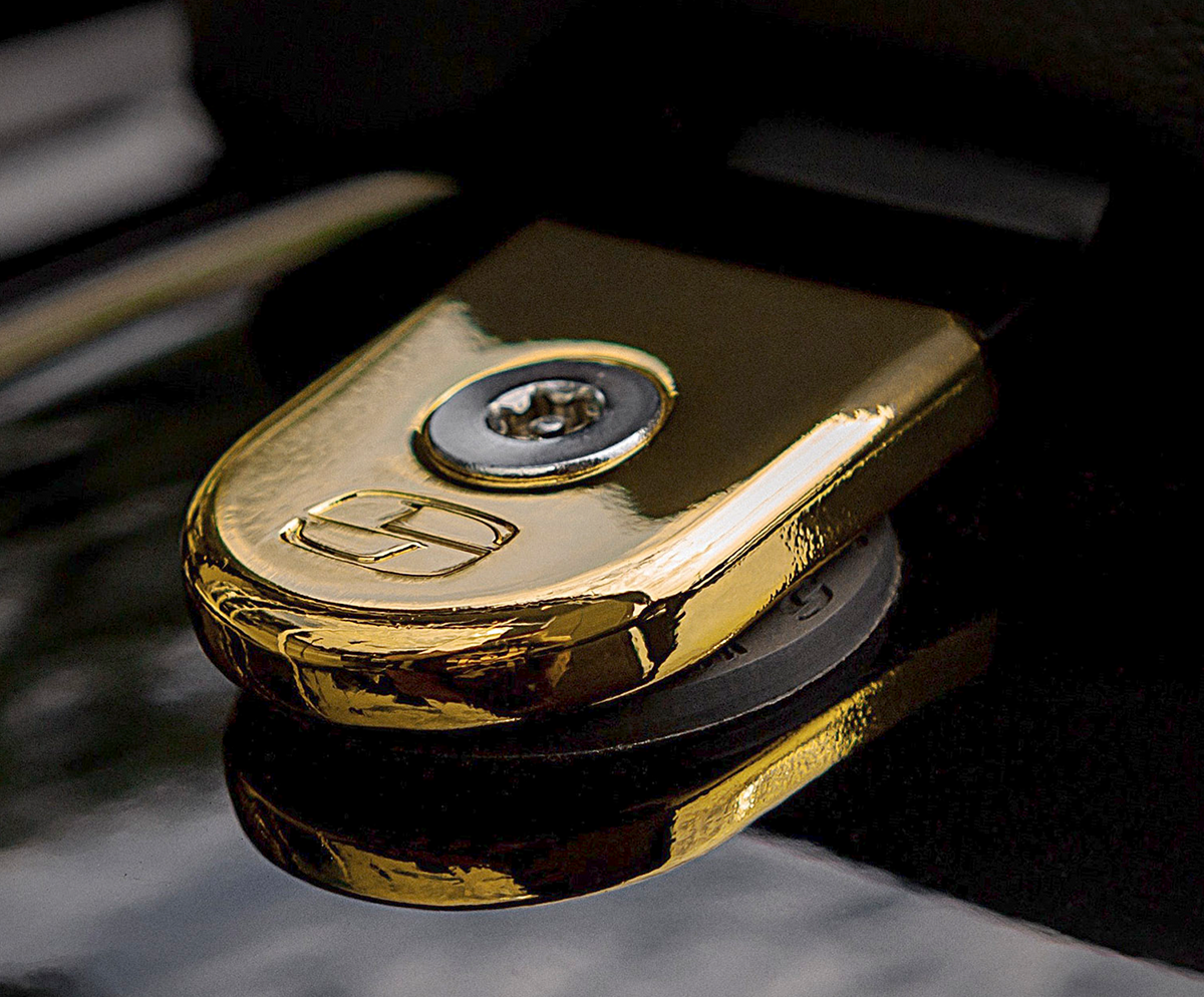 Golden SADDLEMEN Security Seat Screw for motorcycle seats, designed for secure fastening and durability.
