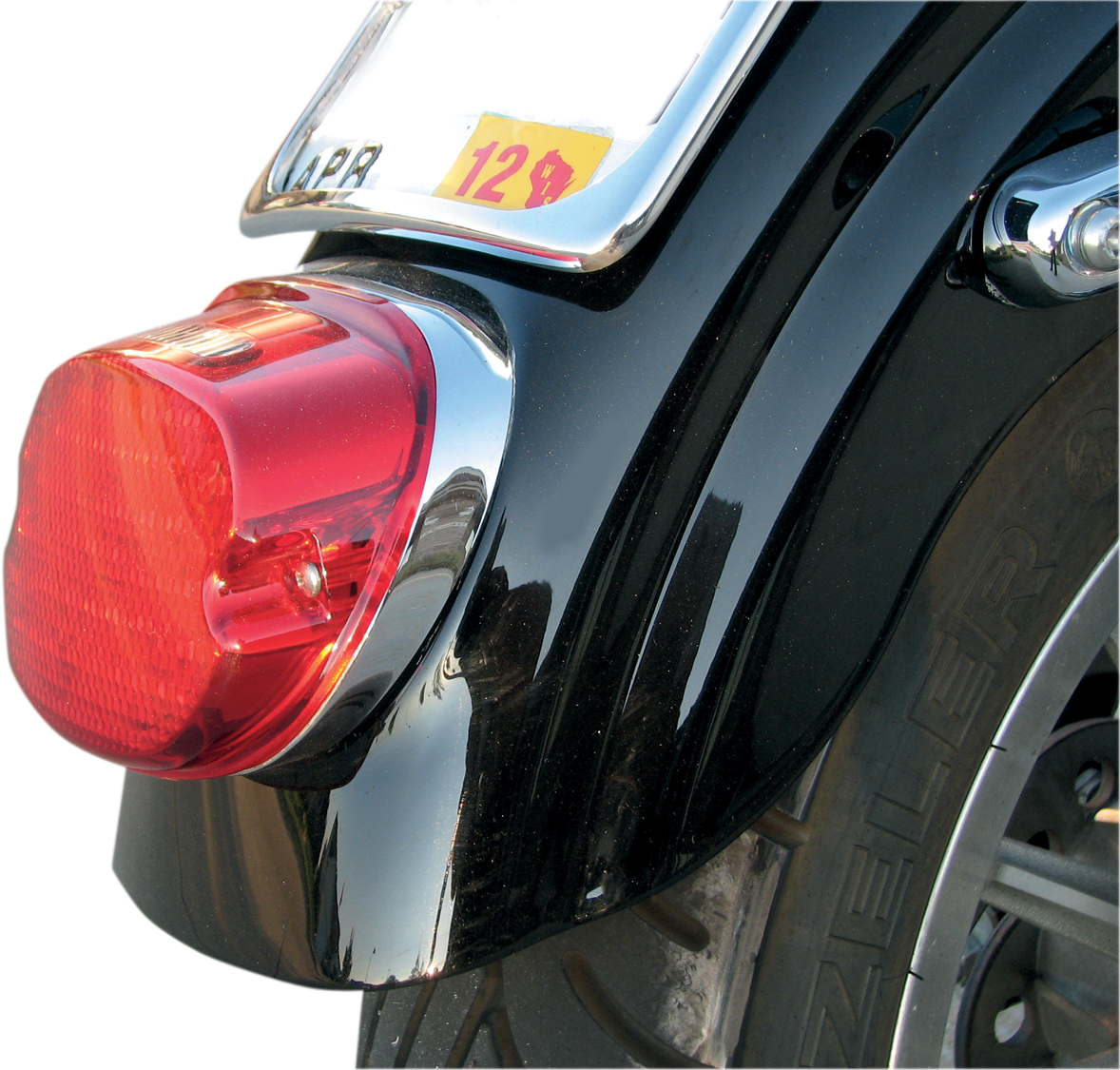 Red LED taillight for motorcycles, DRAG SPECIALTIES L24-0436CRLED top tag light, enhances visibility and safety.