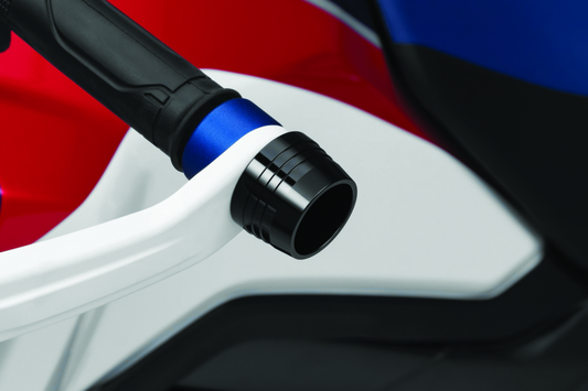 Kuryakyn Lodestar Bar Sliders mounted on a Honda CRF1000L Africa Twin motorcycle, protecting the handlebars and frame.