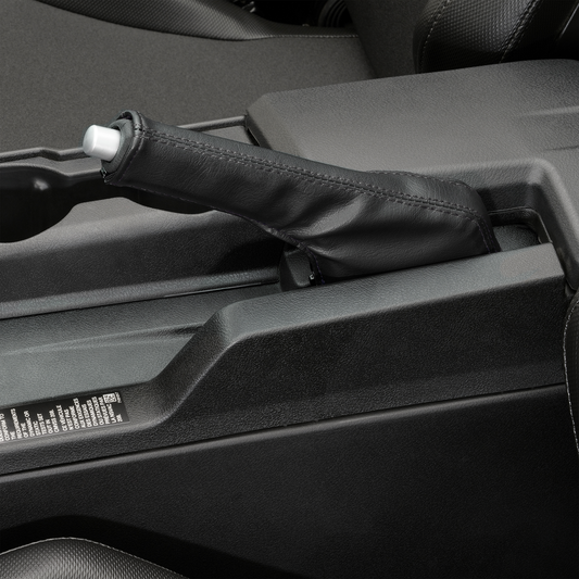 Black stitched SHOW CHROME cover for E-brake on Slingshot engine, designed by Bill's Exhausts.