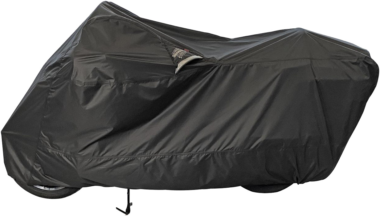 Black DOWCO Weatherall Plus motorcycle cover with ratchet attachment protecting a motorcycle from weather conditions.