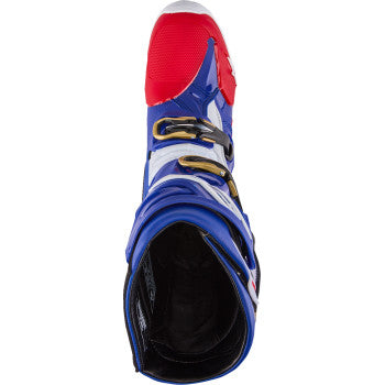 Alpinestars Union Tech 10 motorcycle boots in red, white, and blue with black soles, showing the front and side view.