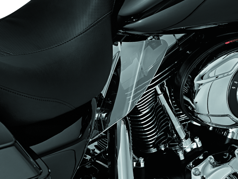 Kuryakyn Saddle Shields heat deflectors for Harley Davidson Touring models, smoke reflective finish on motorcycle seat area.