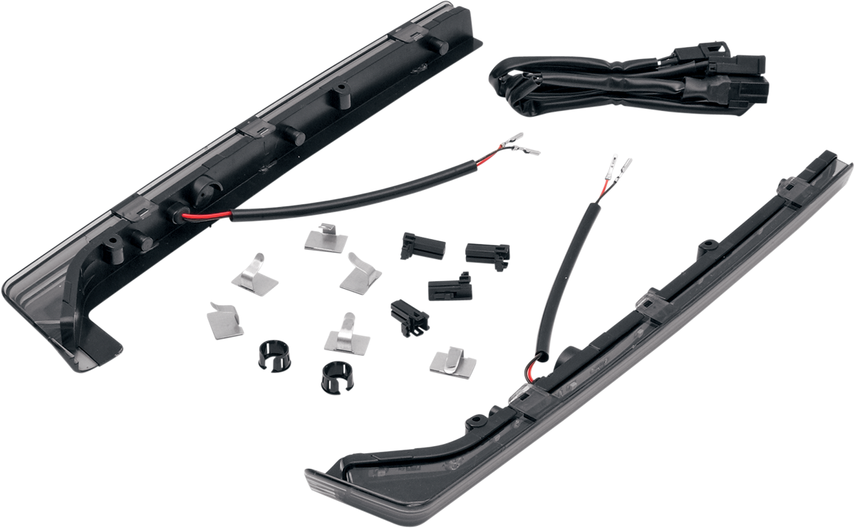 DRAG SPECIALTIES Smoke Lens Side Light Kit showing black smoke-tinted lens and chrome mounting hardware on a motorcycle side light.