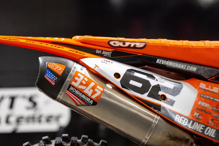 YOSHIMURA RS12 muffler decals in orange with Yoshimura branding, designed for motorcycle exhaust customization.