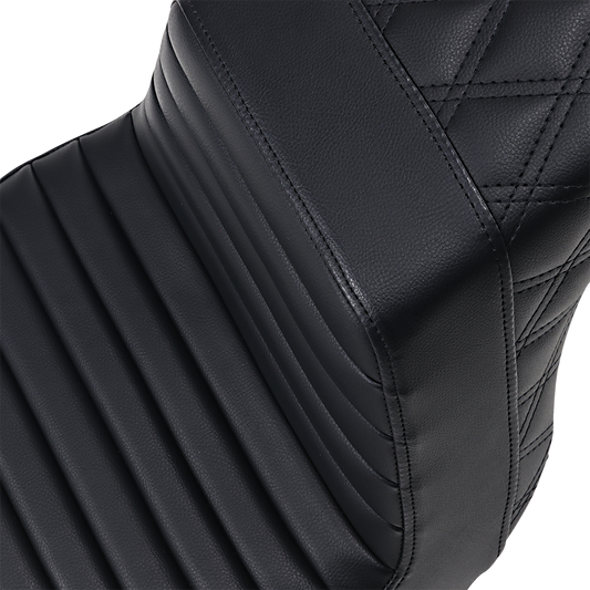 Black Saddlemens Step-Up Seat with tuck-n-roll front and lattice stitch rear for motorcycle, designed for a comfortable ride.