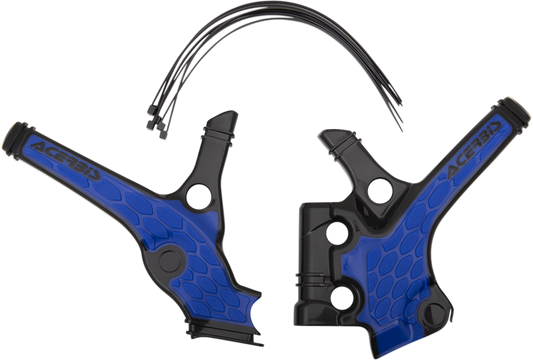 A close-up of Acerbis X-Grip Black and Blue frame guards on a Yamaha YZ85 motorcycle, showing protective body components.