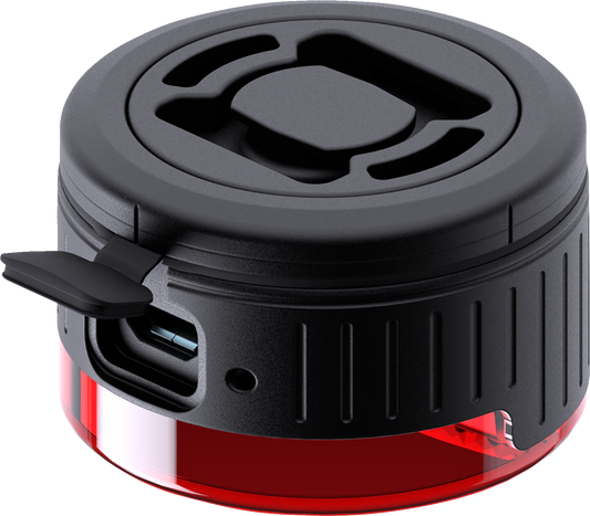 Red SP CONNECT All-Round LED Safety Light attached to a phone, providing 100 lumens for visibility and safety.