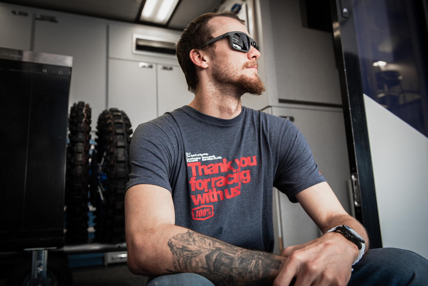Bill's Exhausts 100% Hakan sunglasses in gray with smoke lenses, showcasing a sleek, modern design.