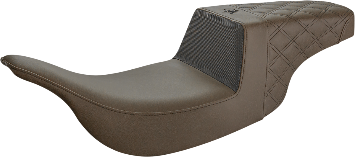 Front carbon fiber and black gripper lumbar seat by Saddlemens Unknown Industries with lattice stitch pattern for motorcycle or bike.