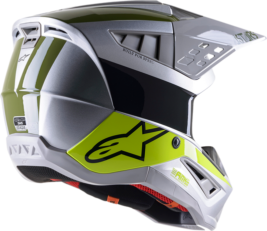 Alpinestars SM5 Bond helmet in silver, yellow, and green with large size, featuring a sleek motorcycle helmet design.