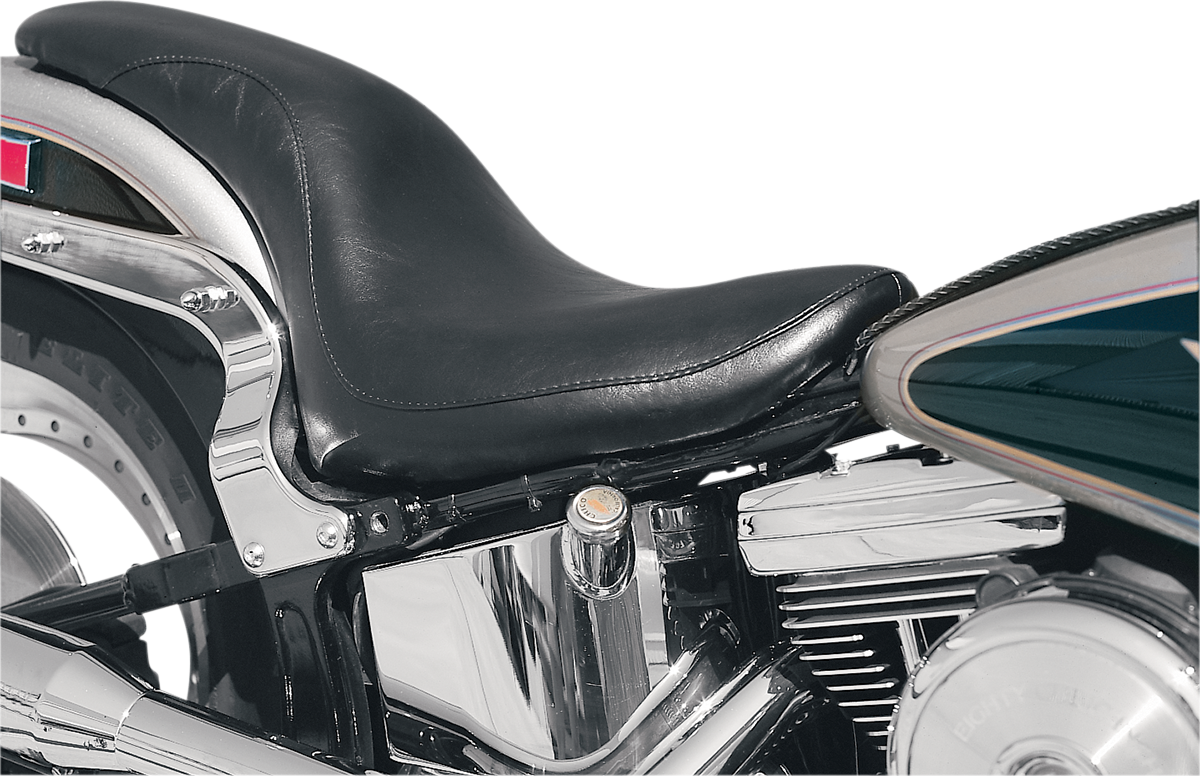 Black SADDLEMEN Profiler motorcycle seat for Softail bikes, featuring smooth, cushioned design with sleek black upholstery.