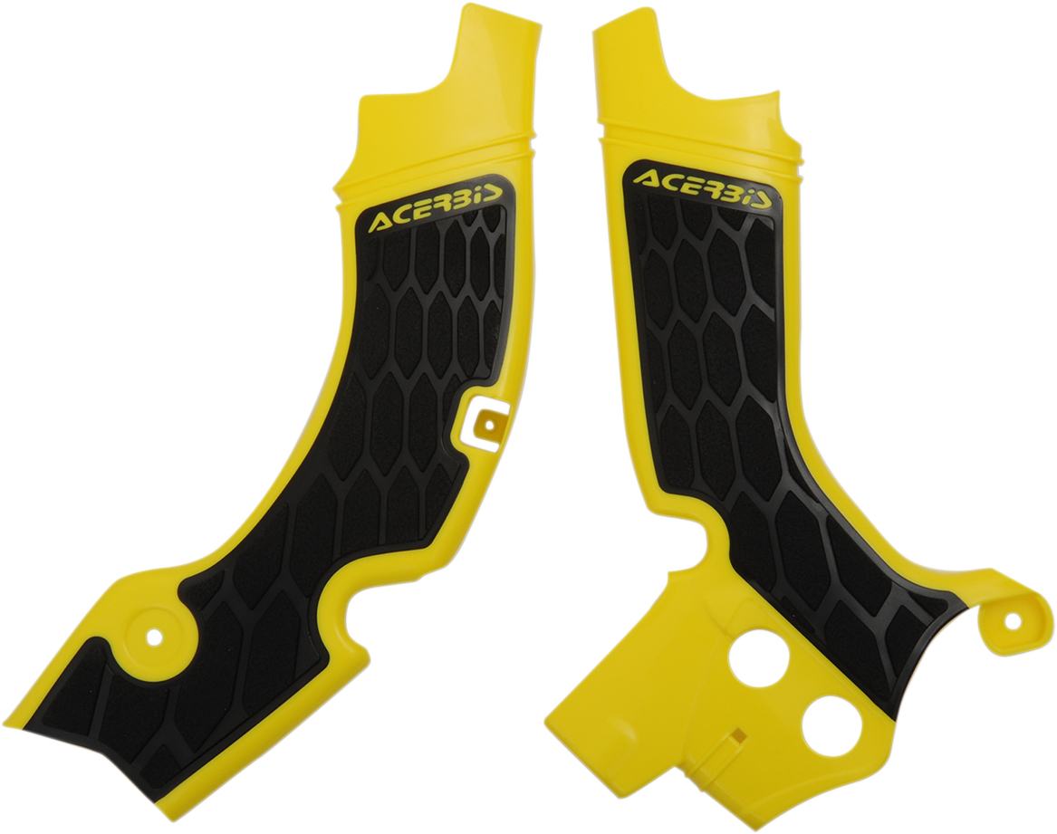 Acerbis X-Grip yellow and black motorcycle frame guards on a bike body, offering protection with a bold design.