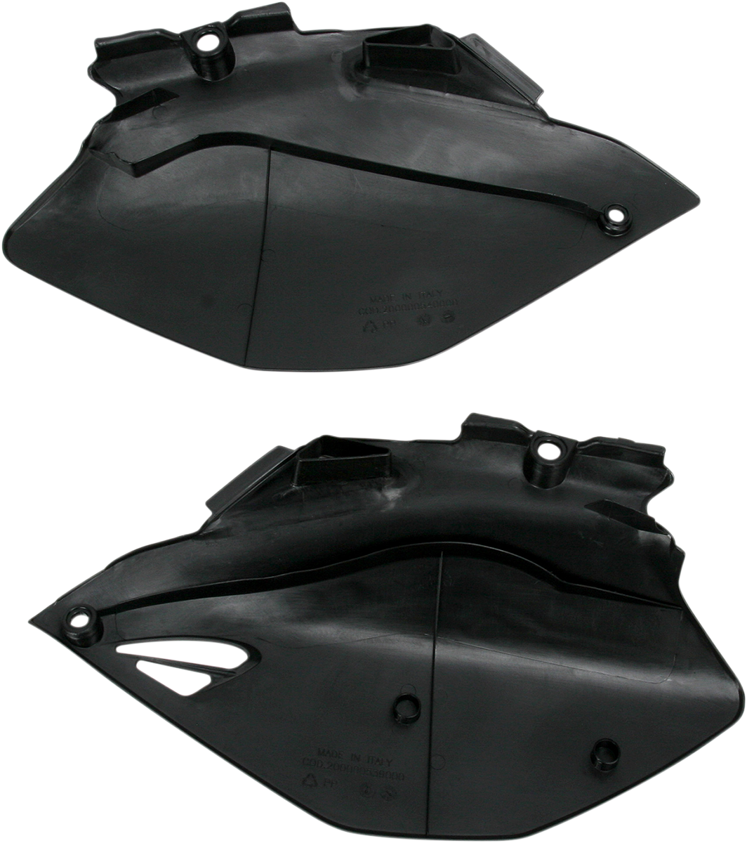 Acerbis black body side panels for motorcycle, showing sleek black plastic panels with mounting points and Acerbis branding.