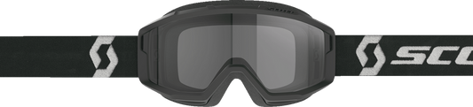 Scott Primal Sand Dust goggles in black and white with dark gray lenses, designed for outdoor and dust protection.